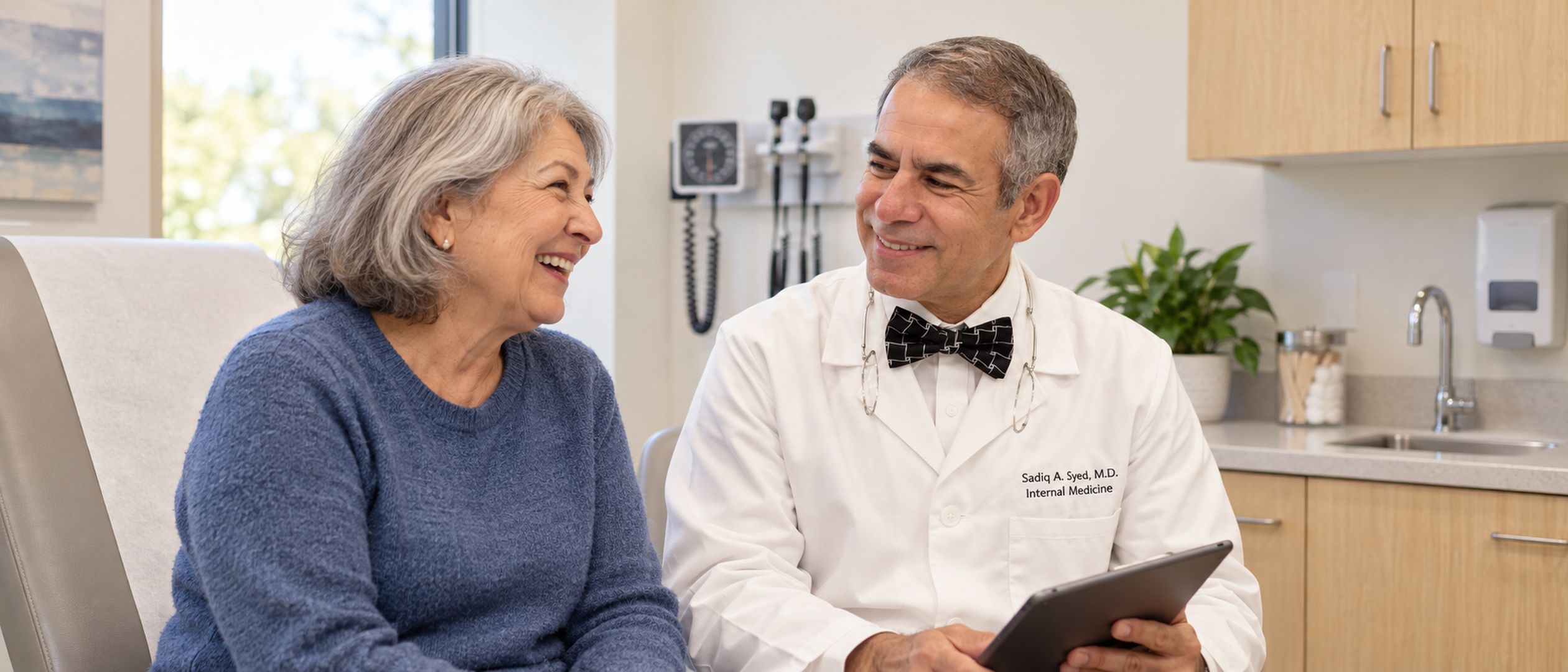 A clinician talking with an older patient