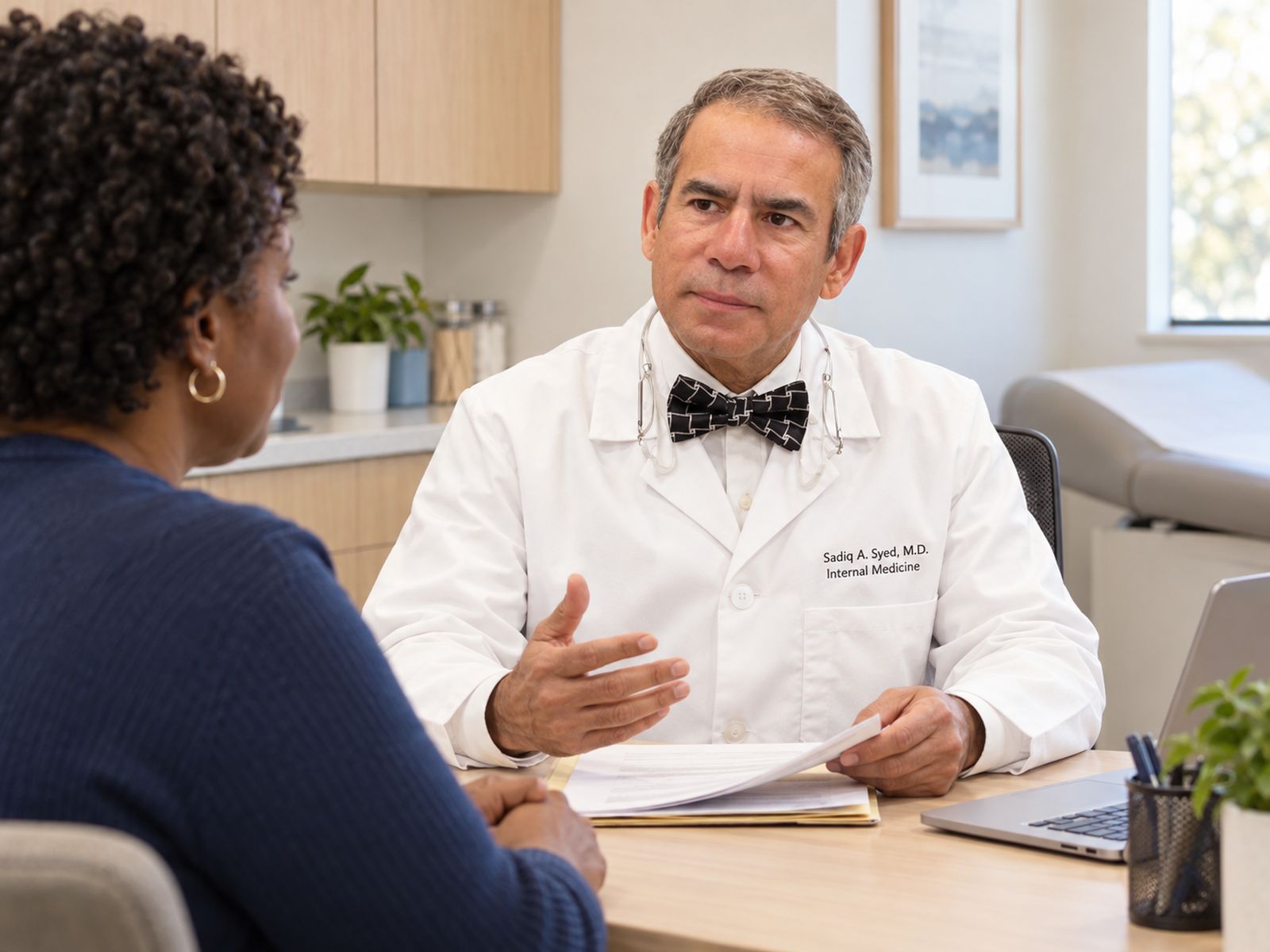 A doctor talking with a patient