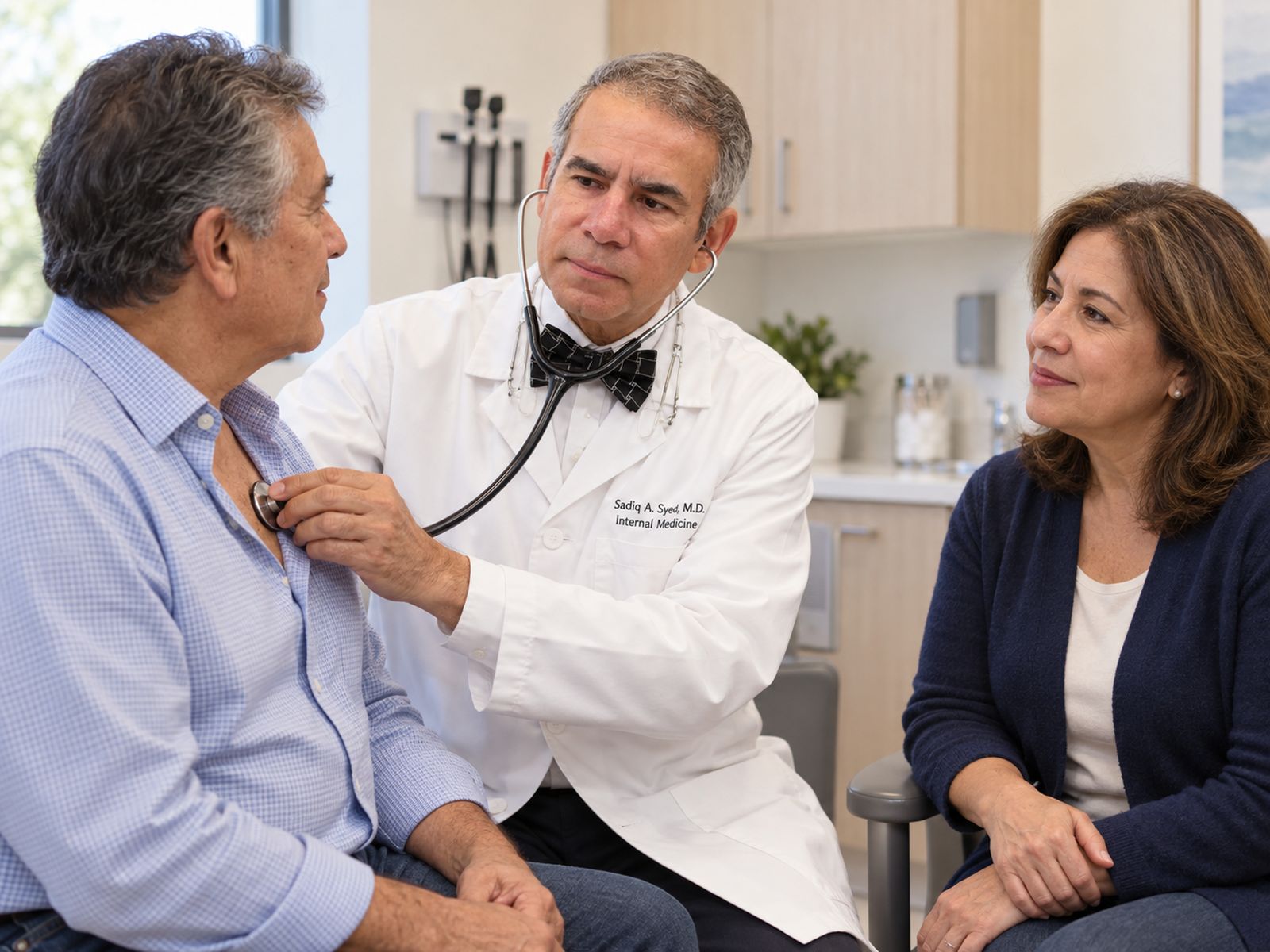 A clinician with a patient in an exam room